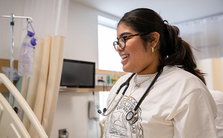 Baldwin Wallace nursing student smiling and wearing stethoscope